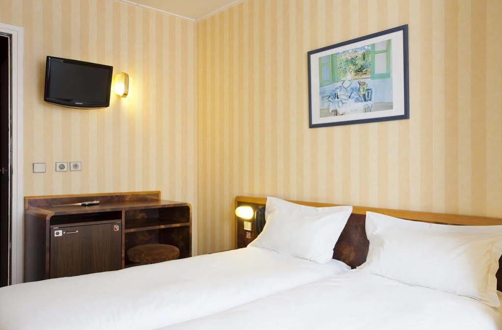 Hotel Moulin Vert Париж Экстерьер фото