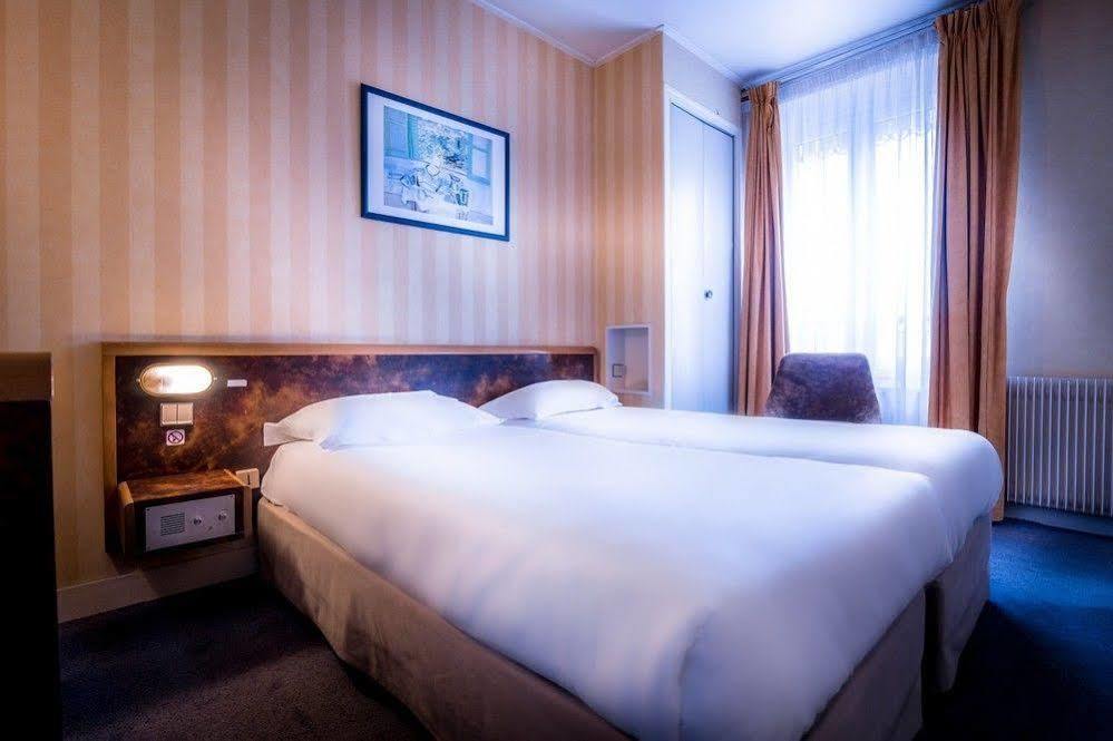 Hotel Moulin Vert Париж Экстерьер фото